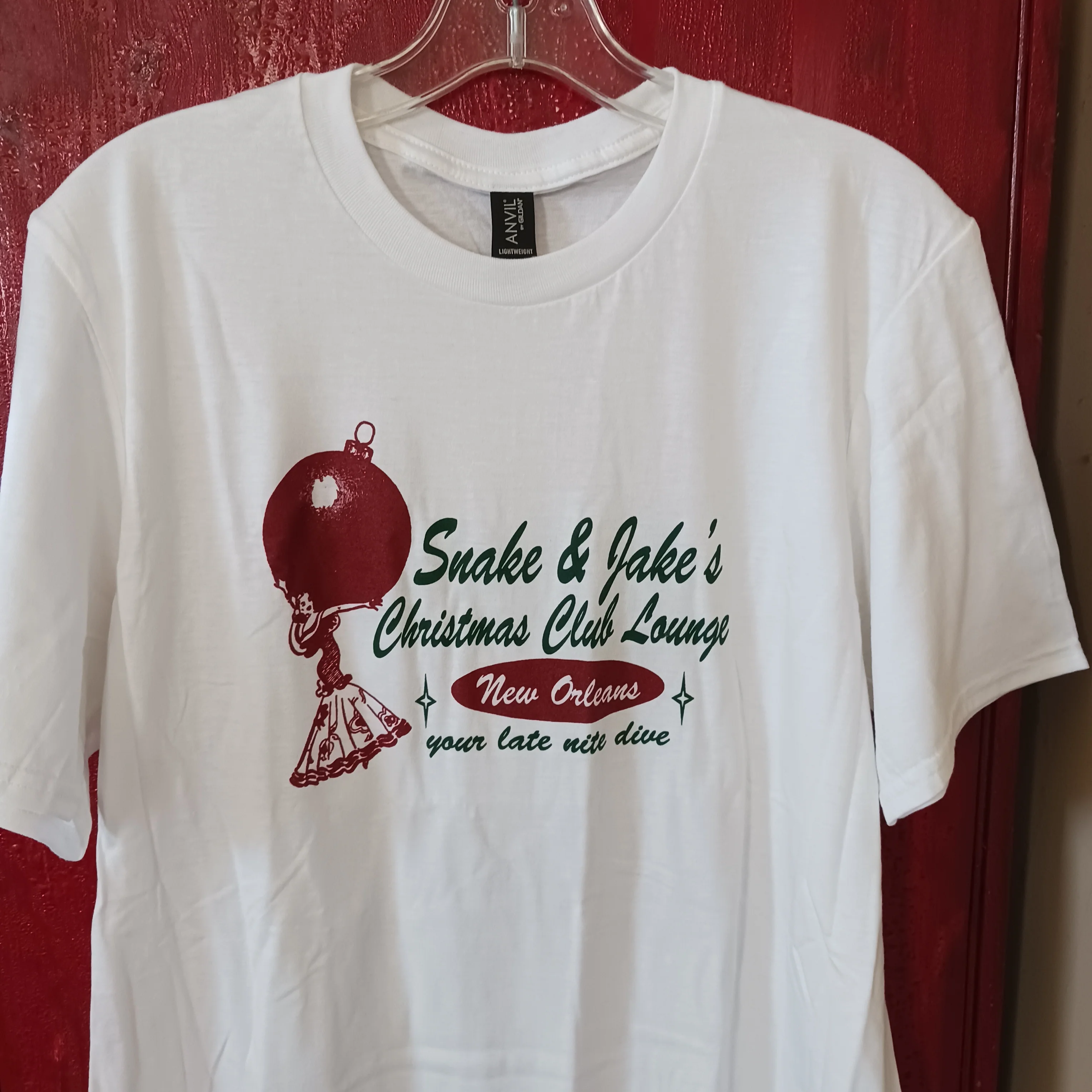 *SALE ONLY 2X & 3X LEFT* SNAKE & JAKE'S CHRISTMAS CLUB LOUNGE UNISEX RETRO  LADY WITH ORNAMENT LOGO  TEE